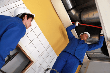 central A/C installation by technicians