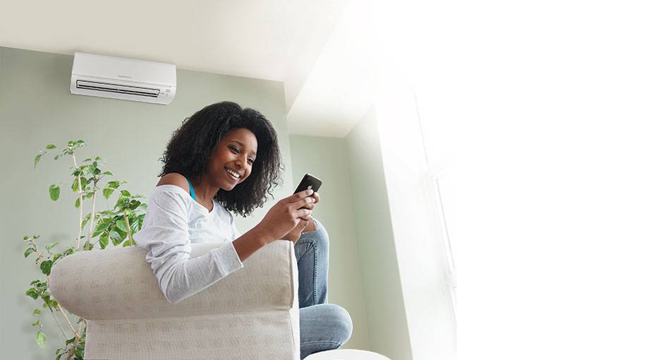 a woman in Home Comfort ac remote Control