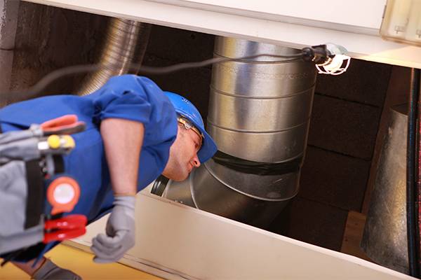 Custom Sheet Metal Fabrication Queens with technician photo