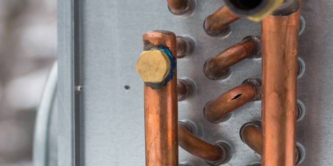 Can I clean my AC coils myself